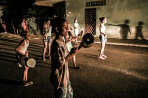 Youths hit drums in protest amid a prolonged electrical blackout in the aftermath of Hurricane Ian in Havana on September 30, 2022. - Hurricane Ian plunged all of Cuba into darkness after downing the island's power network. Electricity was gradually returning on September 29, but many homes remain without power. (Photo by Yamil LAGE / AFP)