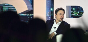 (FILES) In this file photo taken on April 18, 2023 Twitter CEO Elon Musk speaks at the ìTwitter 2.0: From Conversations to Partnerships,î marketing conference in Miami Beach, Florida. - Elon Musk on May 11, 2023 said that he has hired someone to replace him as boss of Twitter and its newly named X Corporation parent. 