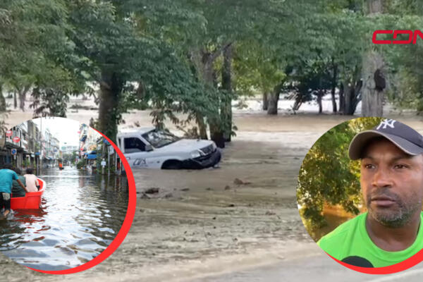 El rio Yuna arrastró una camioneta con tres personas y un héroe sin caspa se lanzó a su rescate. (Foto: CDN Digital)