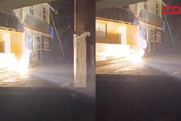 Imagen de cable de alta tensión incendiado frente a una vivienda en Los Cazabes. / Fuente interna.