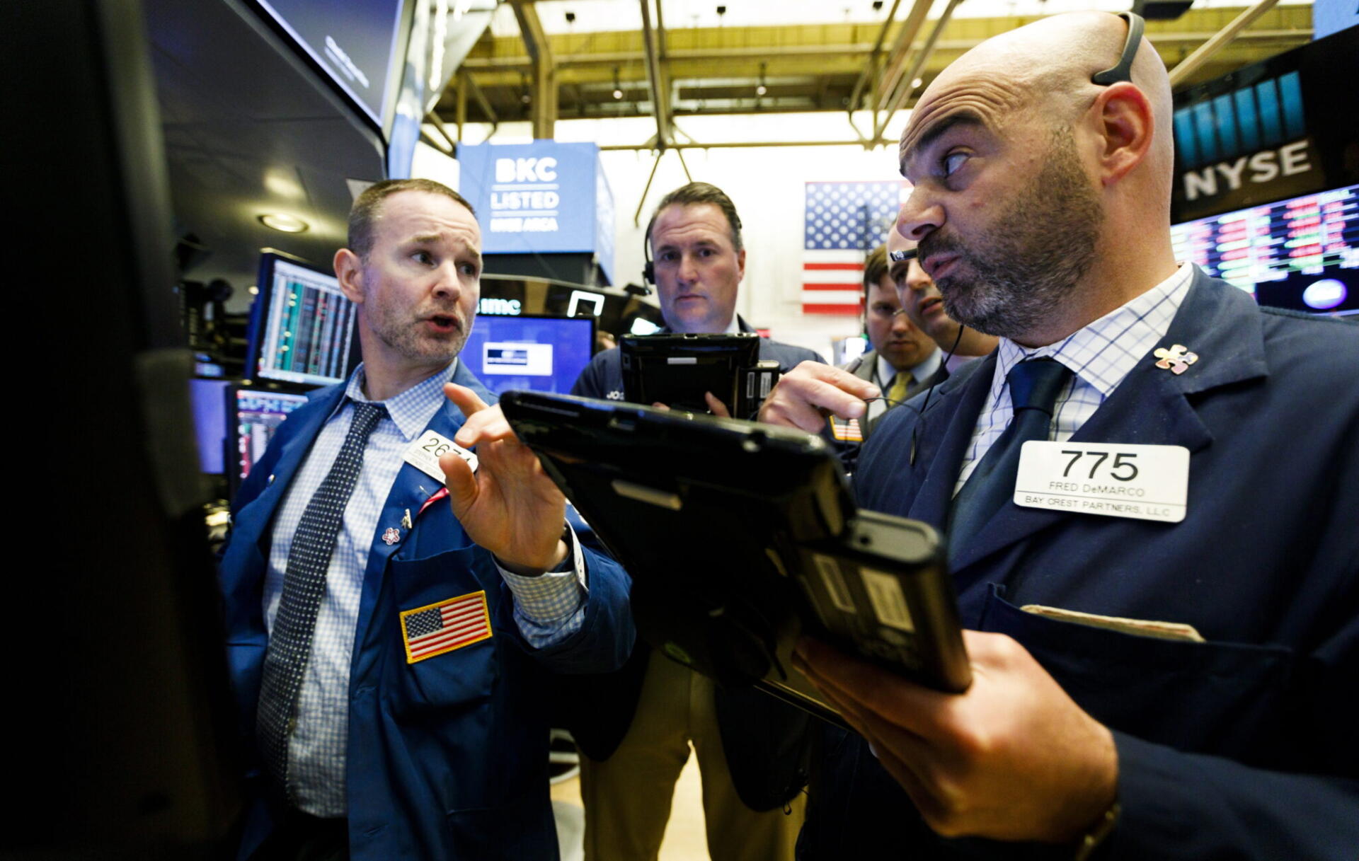 Grupo de Wall Street confirmando alza en las acciones argentinas. Foto: fuente externa.
