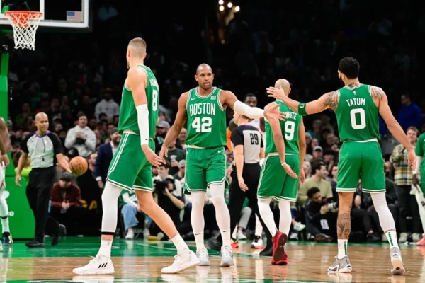 Dec 8, 2023; Boston, Massachusetts, USA; Boston Celtics center Al Horford (42) reacts to game action against against the New York Knicks with forward Jayson Tatum (0) during the first half at TD Garden. Mandatory Credit: Eric Canha-USA TODAY Sports

Eric Canha