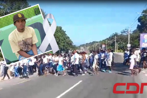 Decenas de personas marcharon en exigencia de justicia para joven ultimado por agentes de la PN. Foto CDN Digital