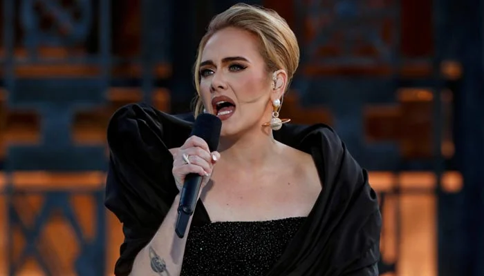 abrazo entre Adele y Celine